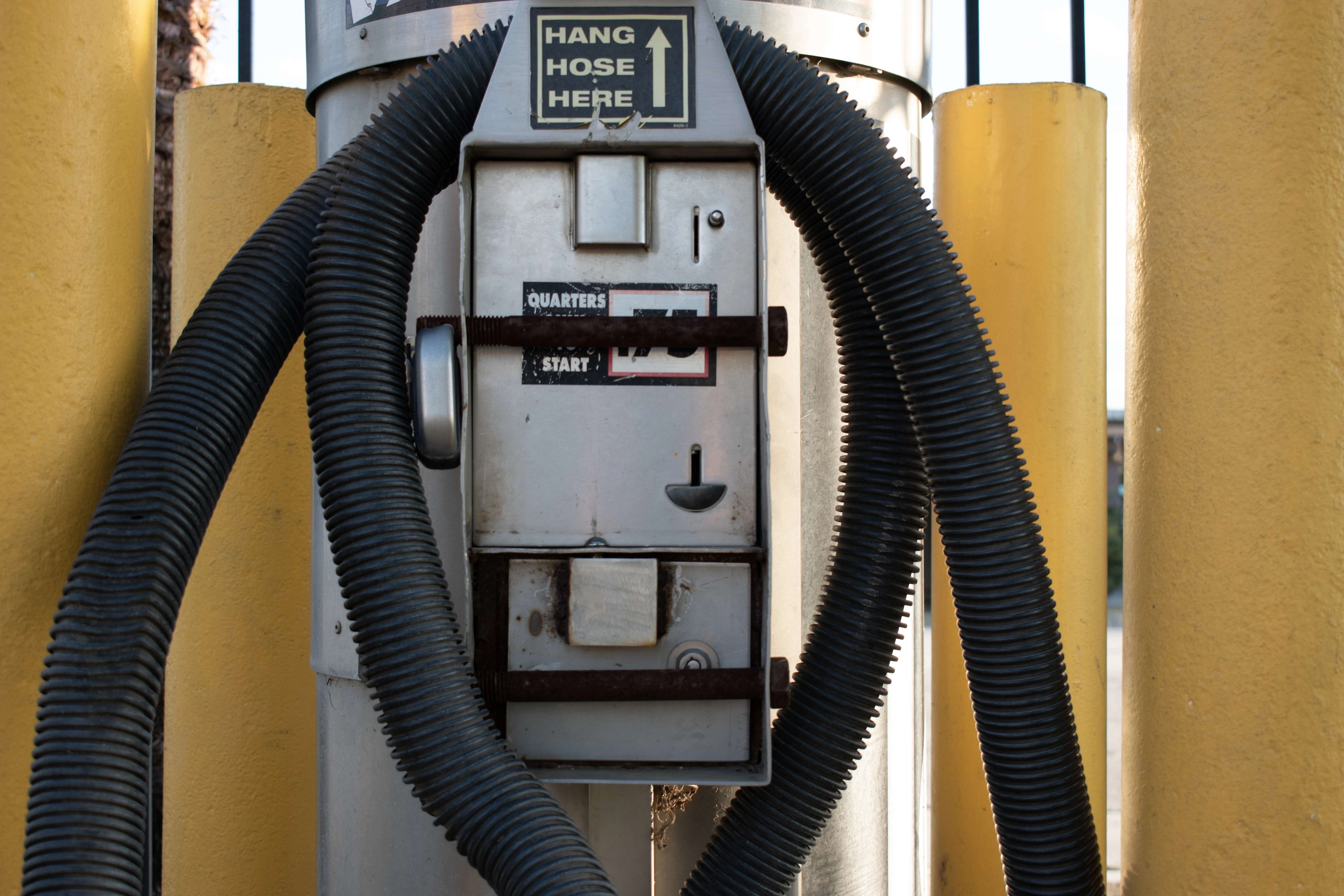 A Polaroid of a self-service car vacuum